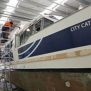 New graphics being installed to the East by West Ferries