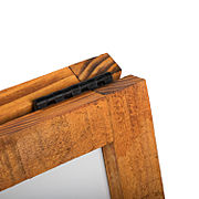 Closeup of the hinge and detail of the wood grain texture