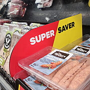 Laser cut 'Super Saver' New World sign