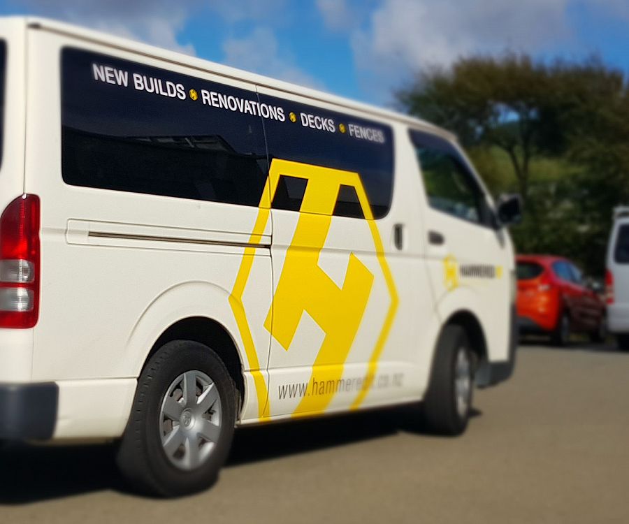 Large logo on the side door of toyota hiace