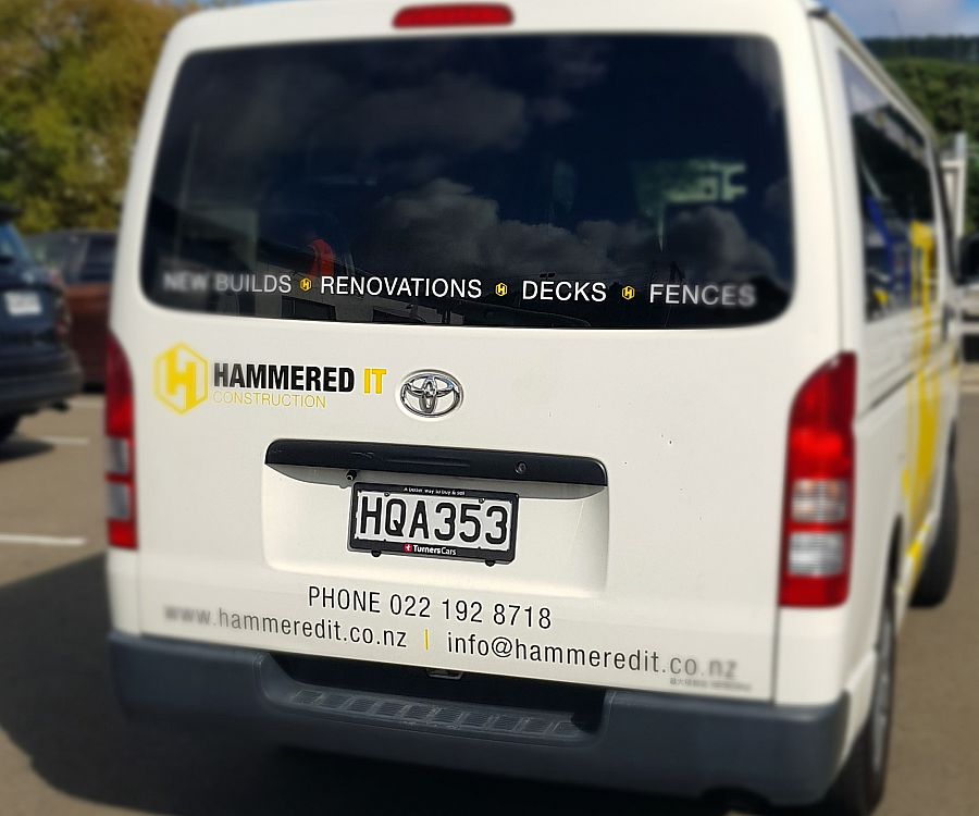 Signage on the tailgate of a Hiace Van